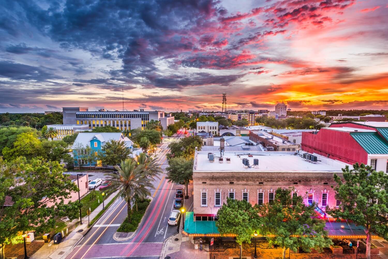 A vibrant cityscape bathed in the warm hues of a sunset