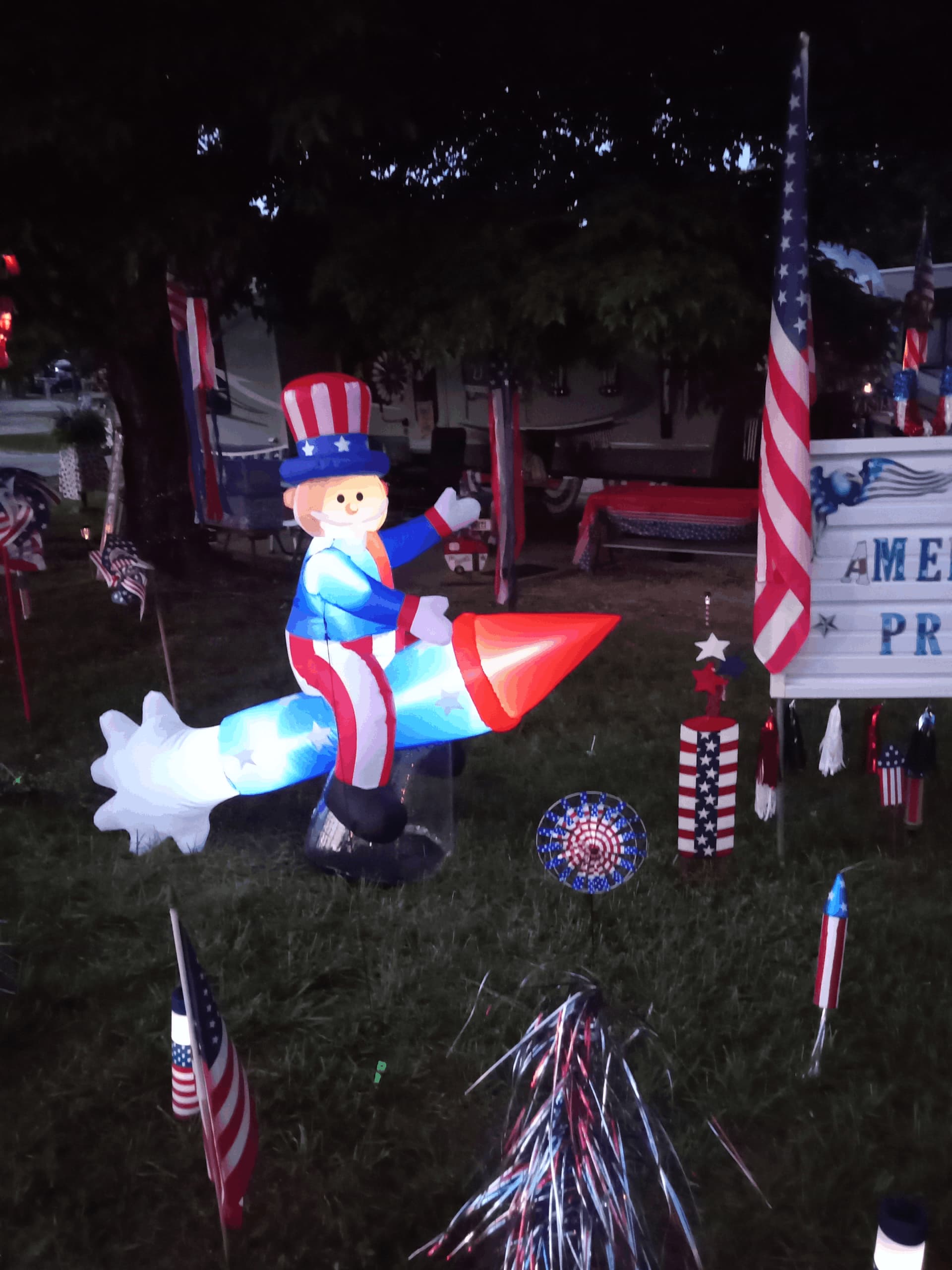 A yard display with a patriotic theme