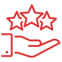 A hand is holding a cell phone with a red background
