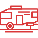 A red and white bus is shown in a close-up view
